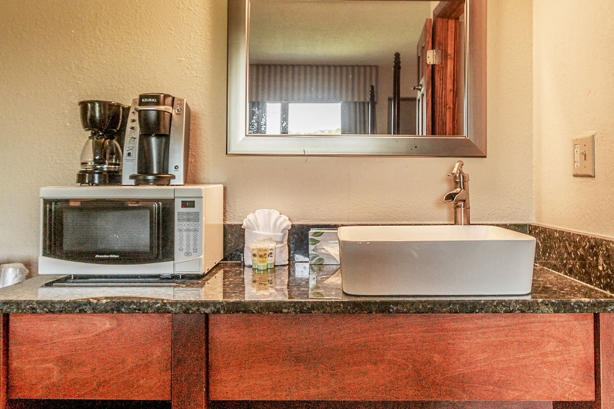 balcony river view superior king (no pets) | premium bedding, down duvets, pillow-top beds, individually decorated