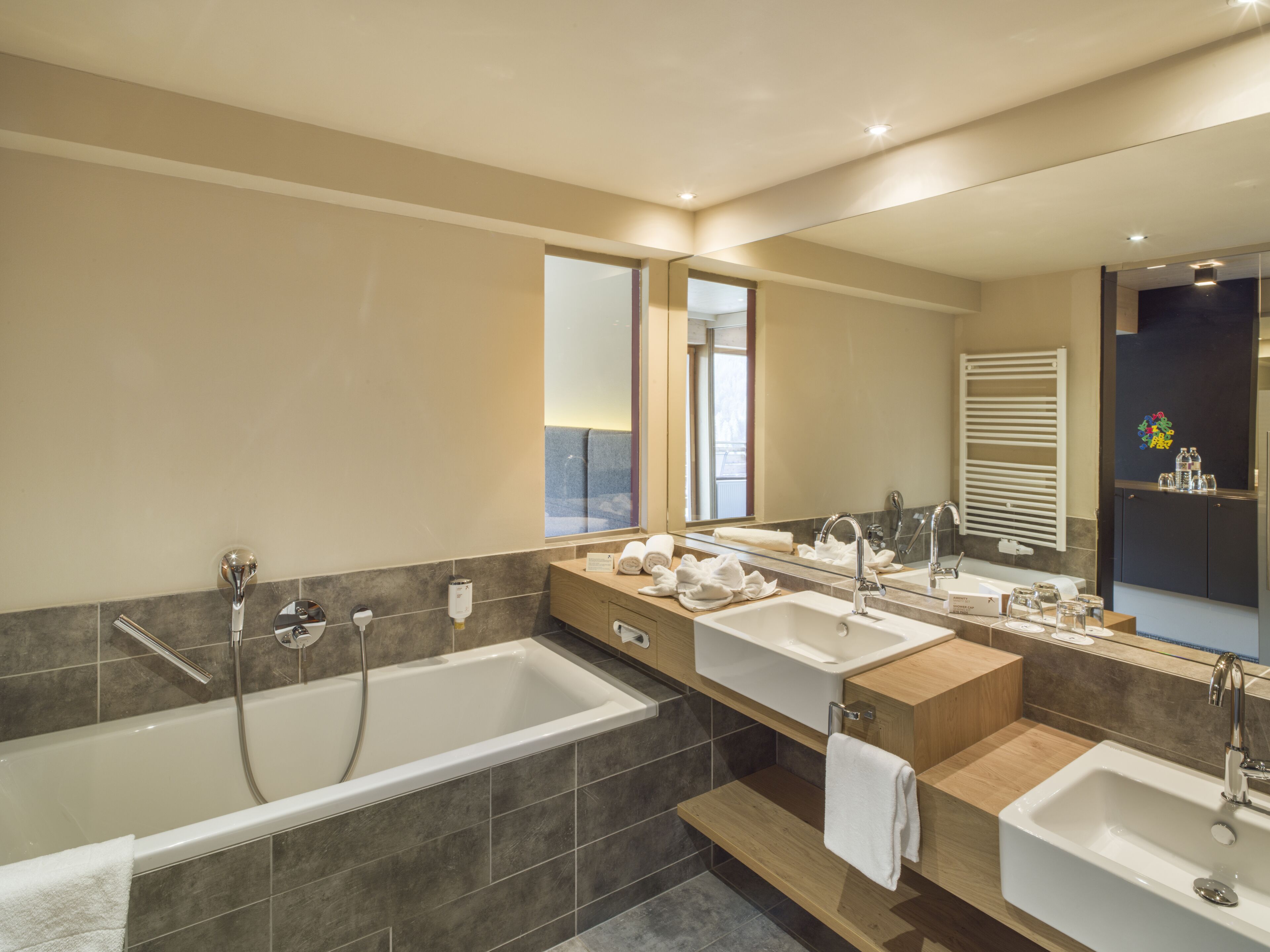 family room comfort | bathroom | free toiletries, hair dryer, bathrobes, slippers