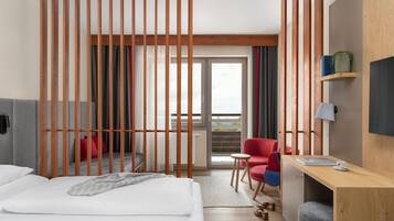 Deluxe Double Room, Balcony | Minibar, in-room safe, blackout drapes, free WiFi