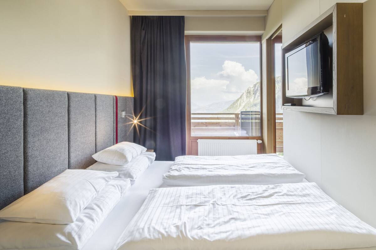 family room comfort | minibar, in-room safe, blackout curtains, iron/ironing board