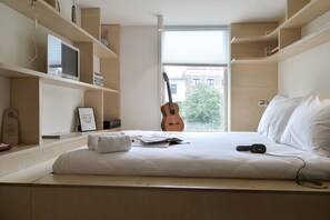 Ropa de cama de alta calidad, minibar y decoración personalizada