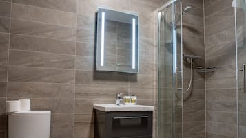Shower, free toiletries, hair dryer, towels