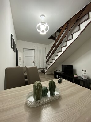 Apartment, Garden Area | Living area | 32-inch LED TV with cable channels, TV - The Place in Rome (Rome)
