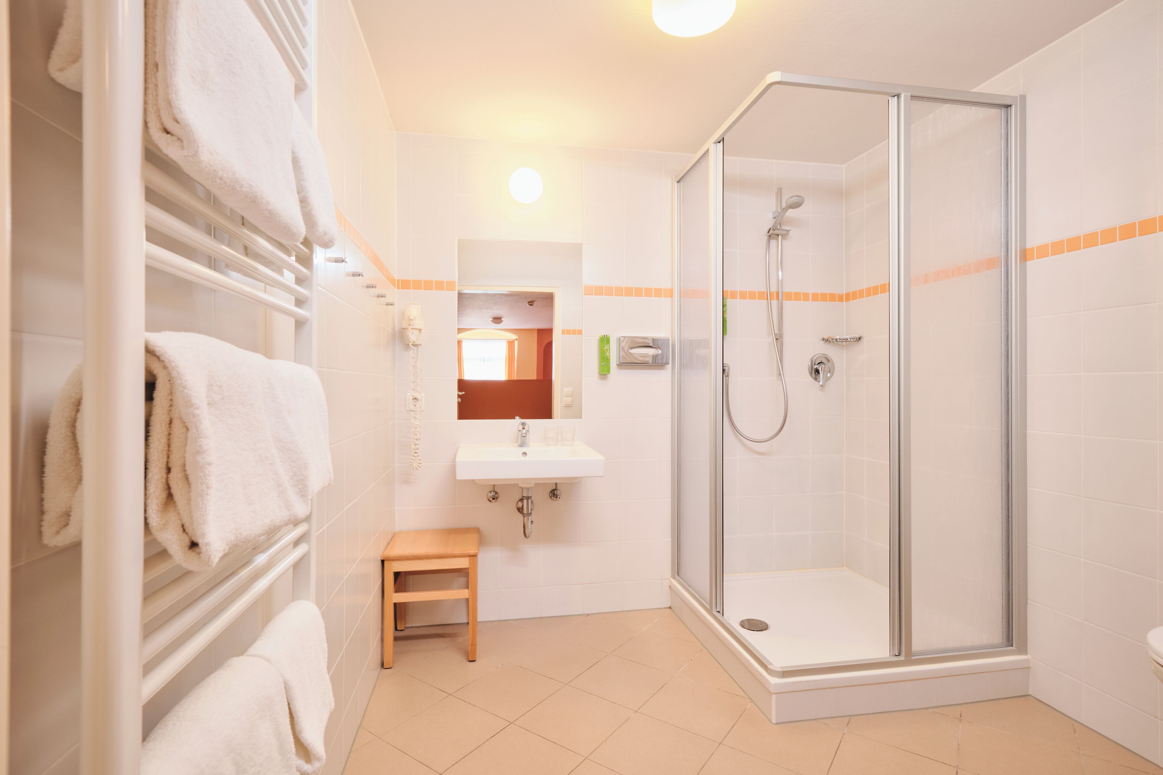 shower, free toiletries, hair dryer, towels