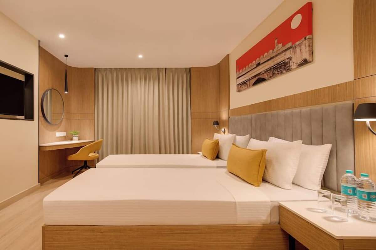 Habitación ejecutiva con 2 camas individuales | Ropa de cama de alta calidad, edredón y minibar