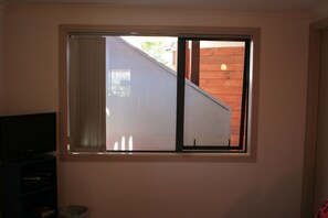 Tweepersoonskamer, en-suite badkamer | Een strijkplank/strijkijzer