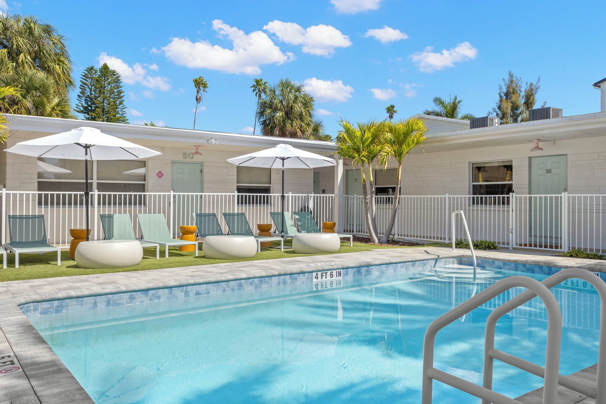 2 outdoor pools, a heated pool, open 8:00 AM to 8:00 PM, pool umbrellas