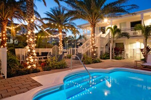 2 outdoor pools, a heated pool, open 8:00 AM to 8:00 PM, pool umbrellas