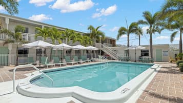 2 outdoor pools, a heated pool, open 8:00 AM to 8:00 PM, pool umbrellas