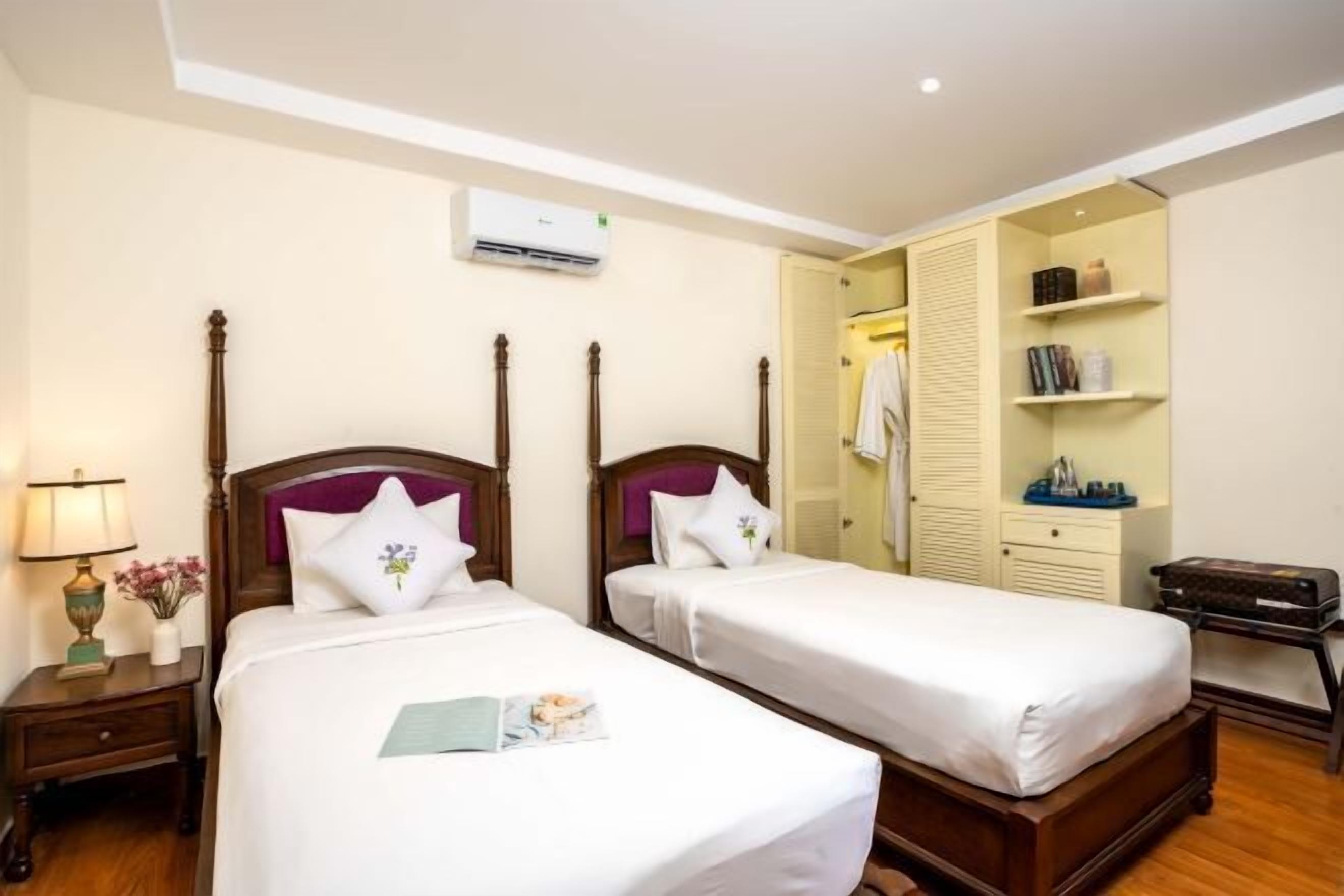 Luxe beddengoed, bedden met traagschuimmatras, een minibar