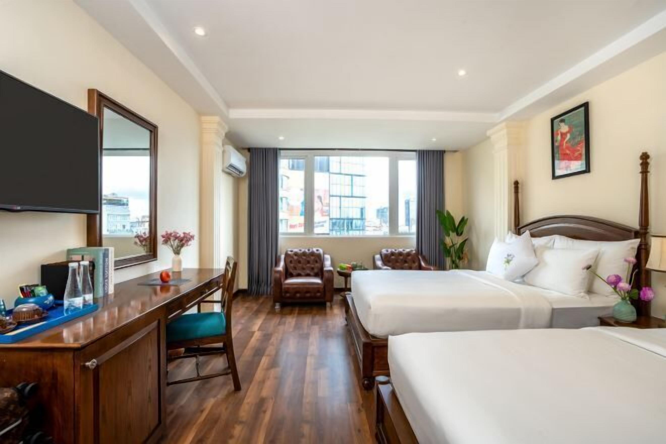 Luxe beddengoed, bedden met traagschuimmatras, een minibar