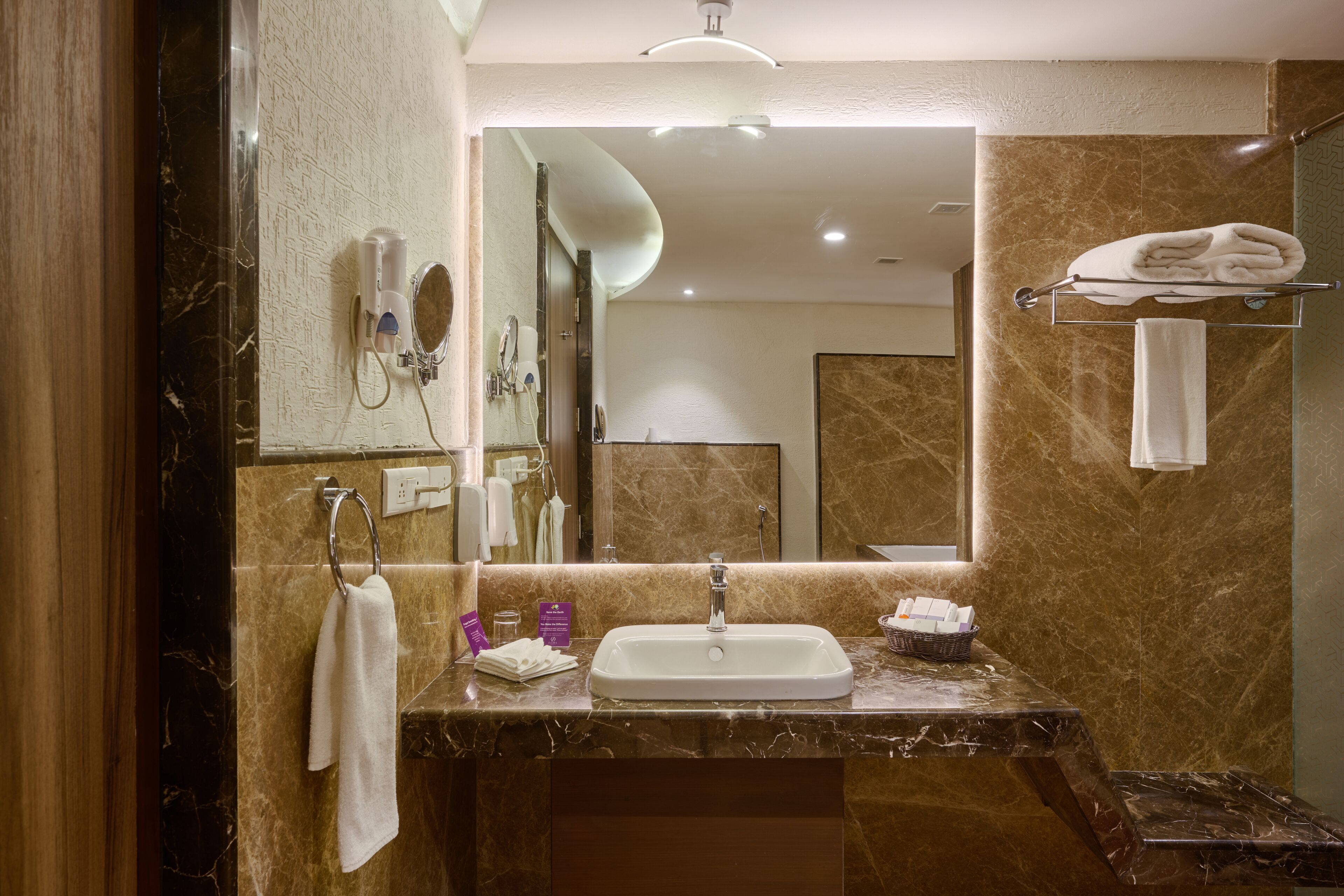 flora suite with complimentary airport transfers | bathroom | designer toiletries, hair dryer, bathrobes, slippers