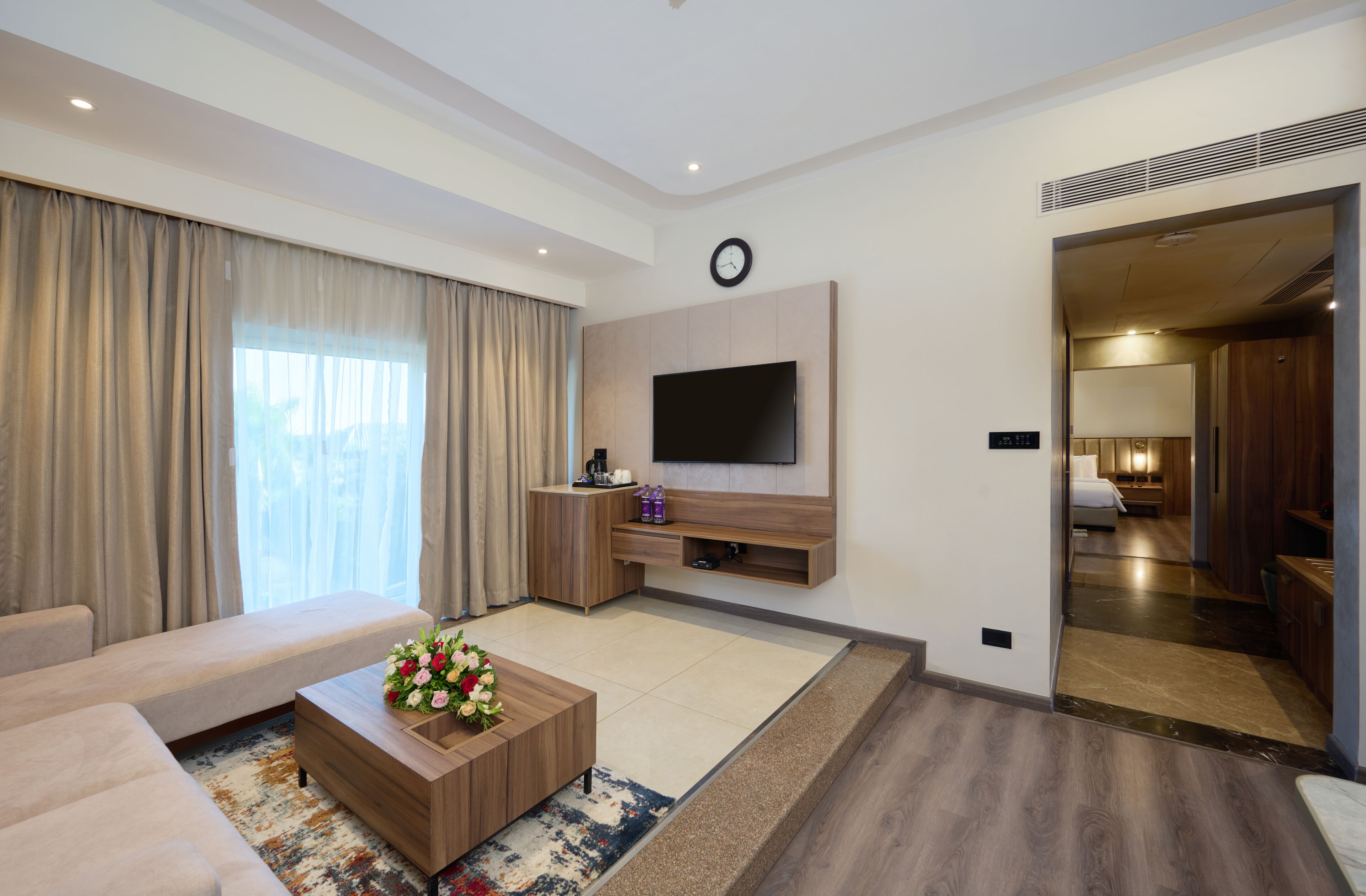 flora suite with complimentary airport transfers | living area | 32-inch lcd tv with satellite channels, tv, ping pong