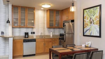 Hypo-allergenic bedding, down duvets, desk, laptop workspace