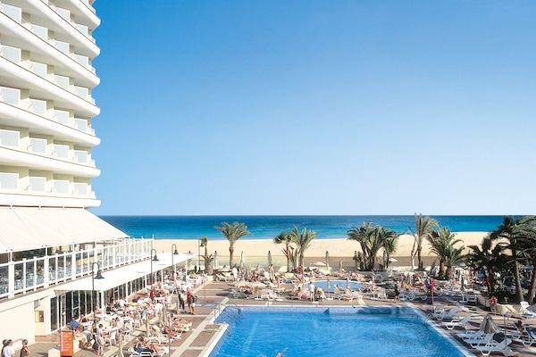 2 outdoor pools, pool umbrellas, sun loungers