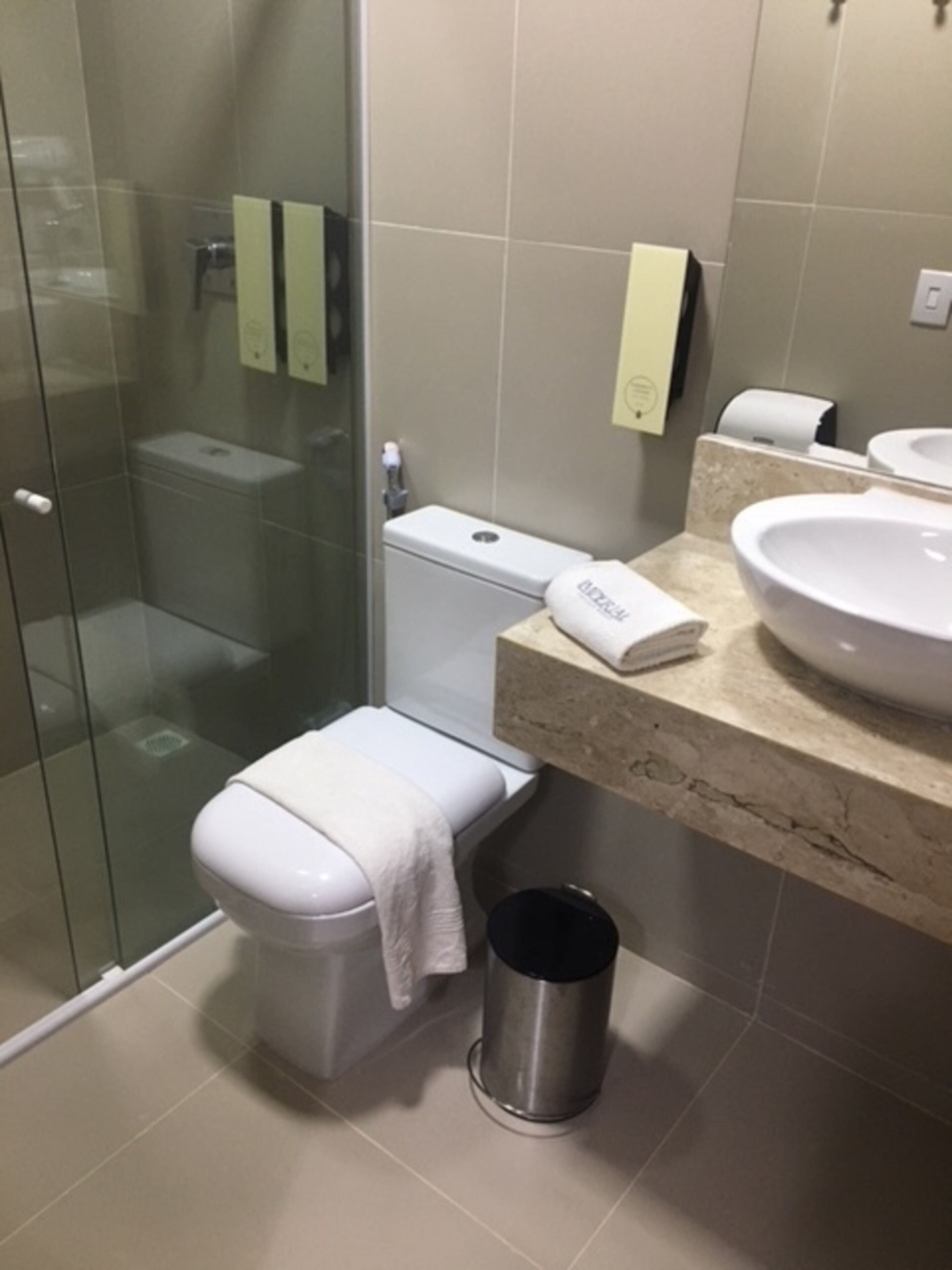 deluxe room | bathroom | shower, hair dryer, towels