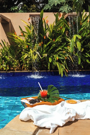 Outdoor pool, sun loungers. Imperial Palace Hotel