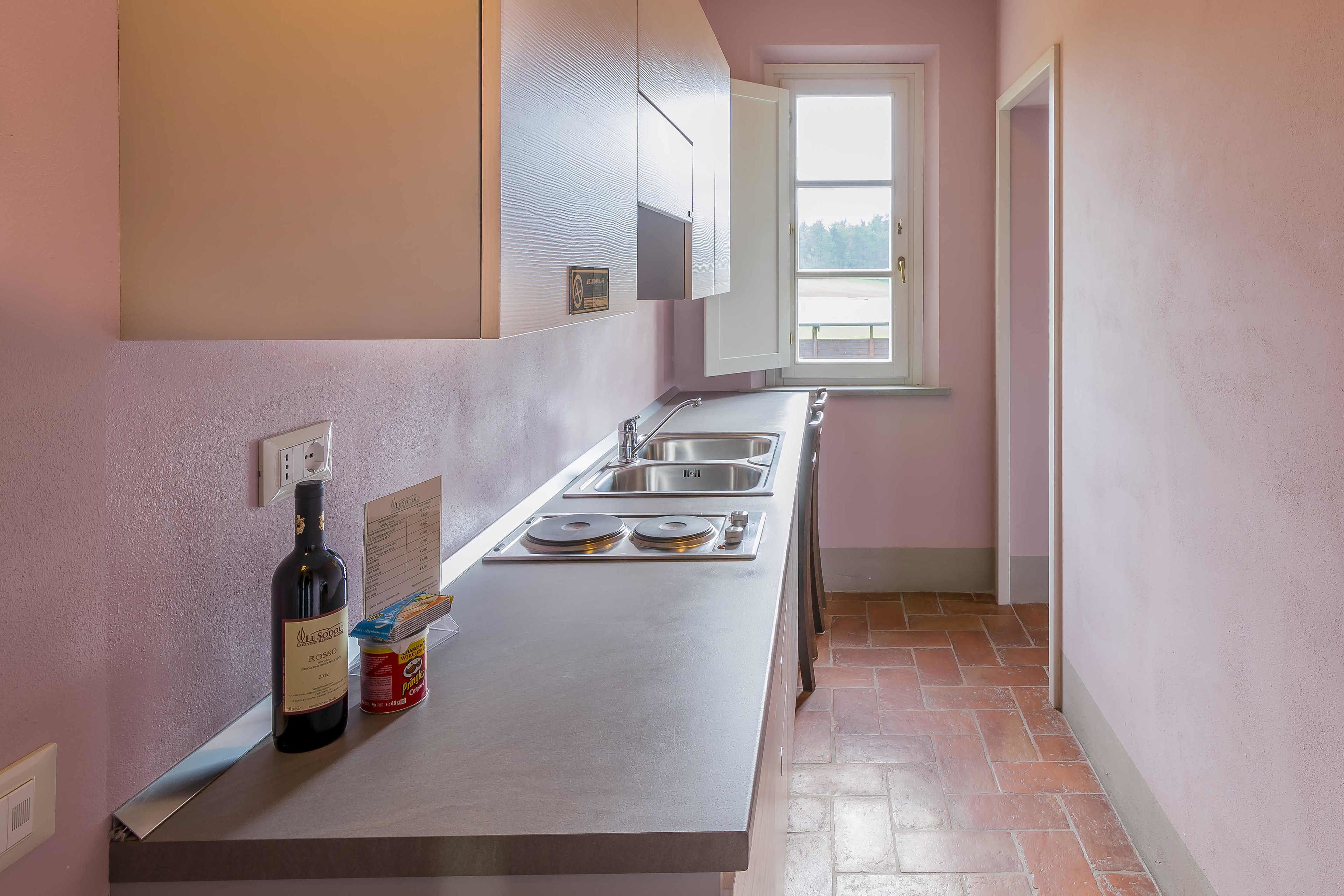 fridge, stovetop, toaster, cookware/dishes/utensils