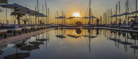 Seasonal outdoor pool, open 10:00 AM to 6:00 PM, cabanas (surcharge)