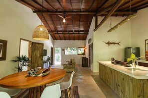 Superior Chalet | Living room | LCD TV, DVD player, first-run films - Pousada do Bosque (Porto Seguro)