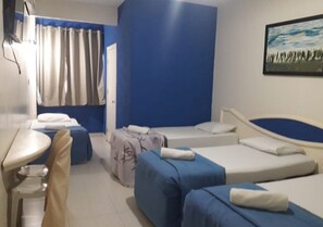 Standard Quadruple Room | Living area | 32-inch LCD TV with satellite channels, TV - Biss Inn (Goiania)
