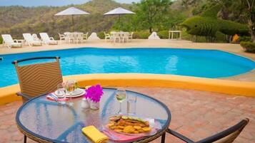 Breakfast, lunch, dinner served; pool views