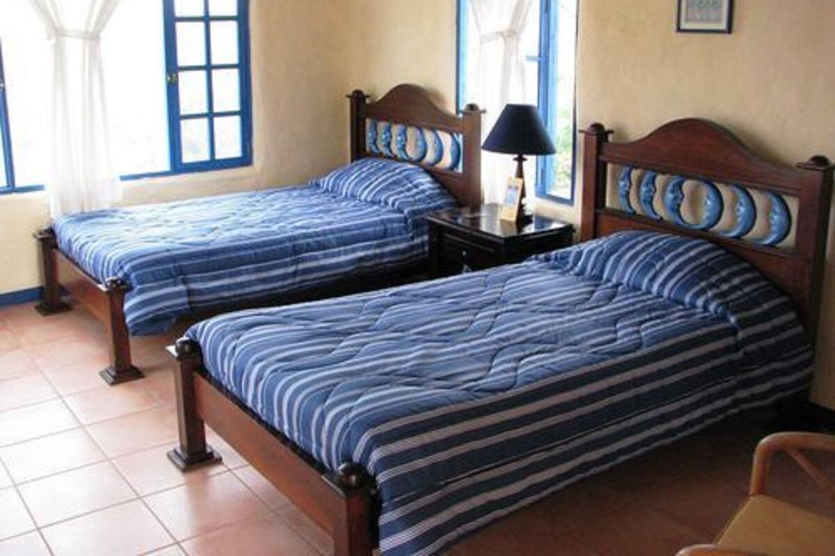 Doppel- oder Zweibettzimmer