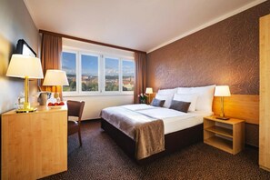 Minibar, in-room safe, desk, laptop workspace - Hotel Charles Central - Czech Leading Hotels (Prague)