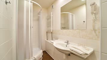 Shower, free toiletries, hair dryer, towels