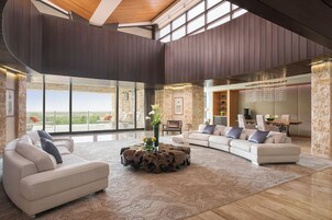 Presidential Suite - King Bed & 2 Queen Beds | Living area | 42-inch LCD TV with satellite channels, TV, iPod dock