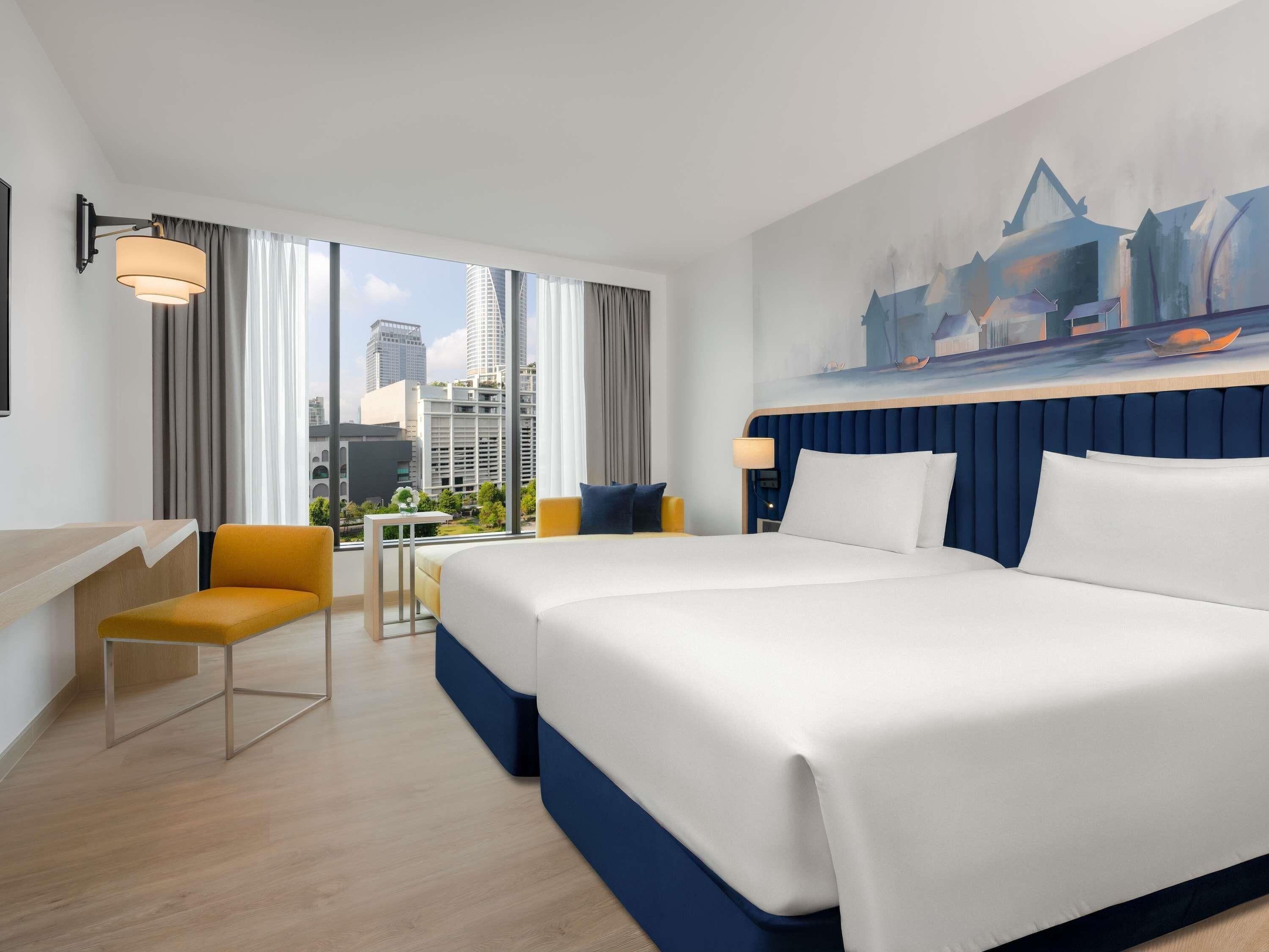 Quarto premier, 2 camas de solteiro, vista para o parque | Cofres nos quartos, escrivaninha, espaço de trabalho para notebook