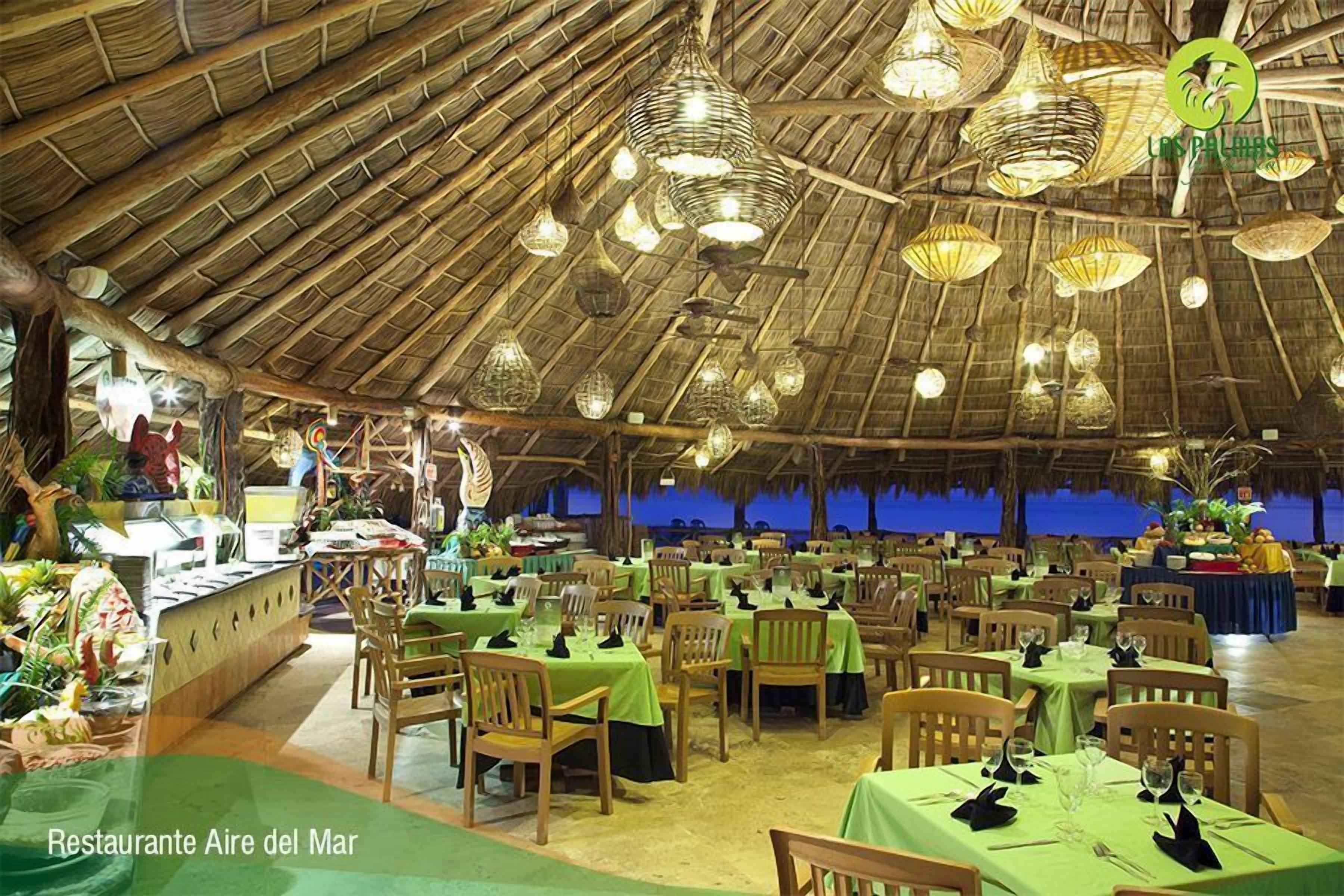 Breakfast, lunch, dinner served; beach views 