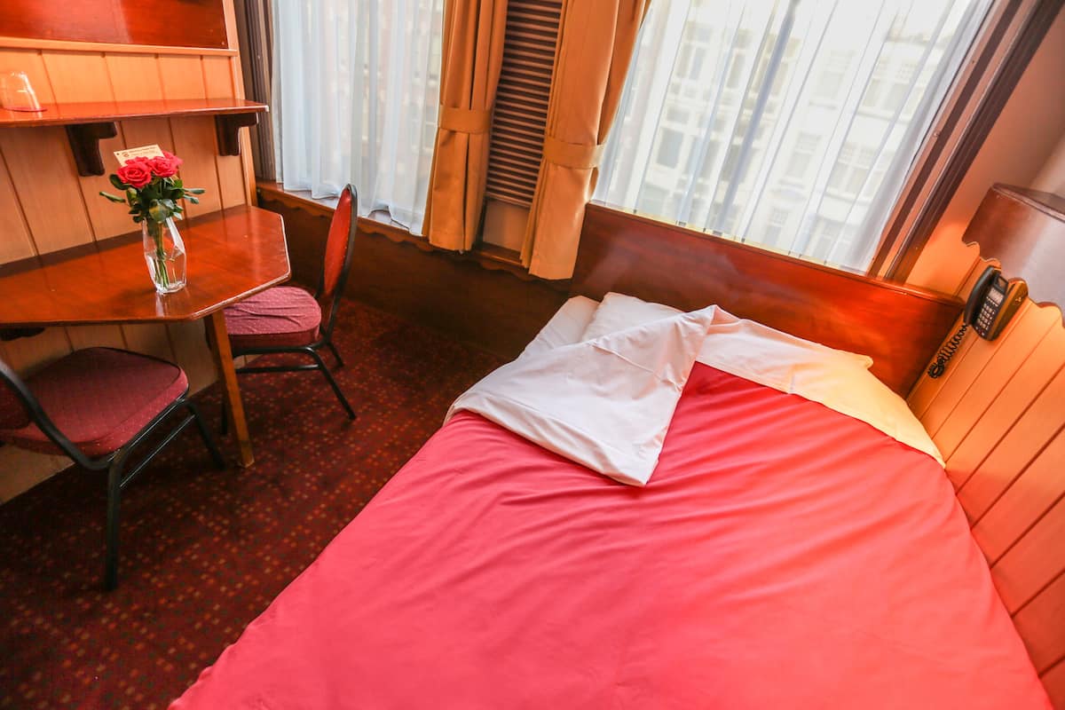 Premium bedding, memory foam beds, laptop workspace