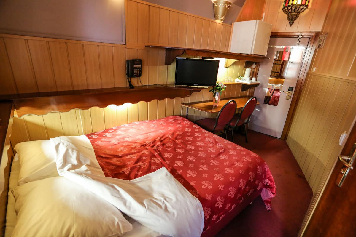 Premium bedding, memory foam beds, laptop workspace