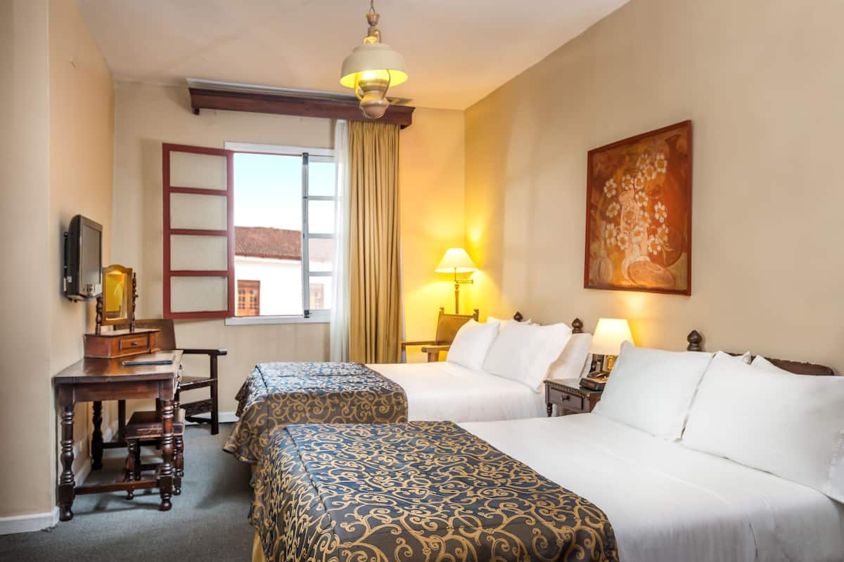 Standard Quadruple Room, 2 Bedrooms | Premium bedding, minibar, in-room safe, individually decorated