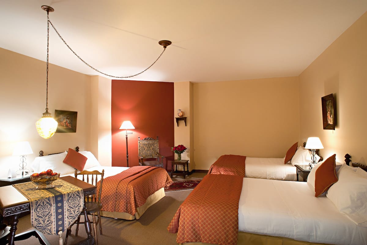 Standard Triple Room | Premium bedding, minibar, in-room safe, individually decorated