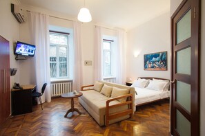 Studio Suite | Living area | LED TV, DVD player - Renaissance Suites Odessa (Odesa)