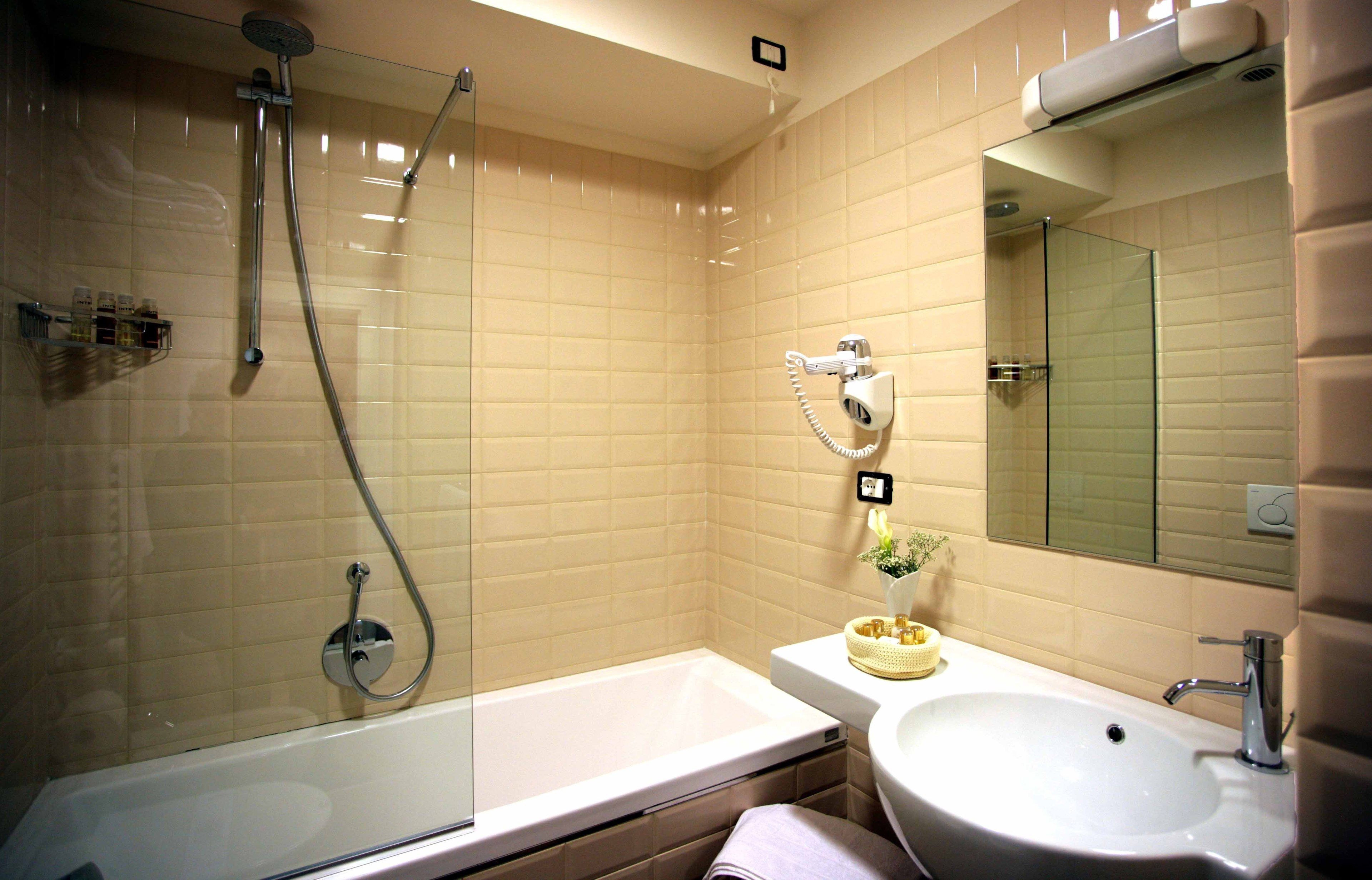 rainfall showerhead, hair dryer, bathrobes, slippers