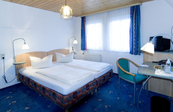 Premium bedding, pillow-top beds, individually furnished, desk