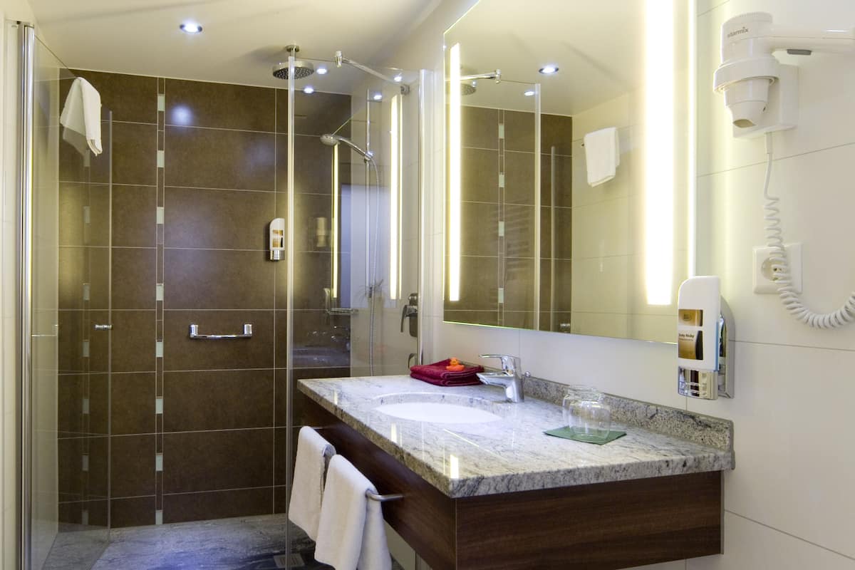 superior double or twin room, 1 king bed | bathroom | free toiletries, hair dryer, towels