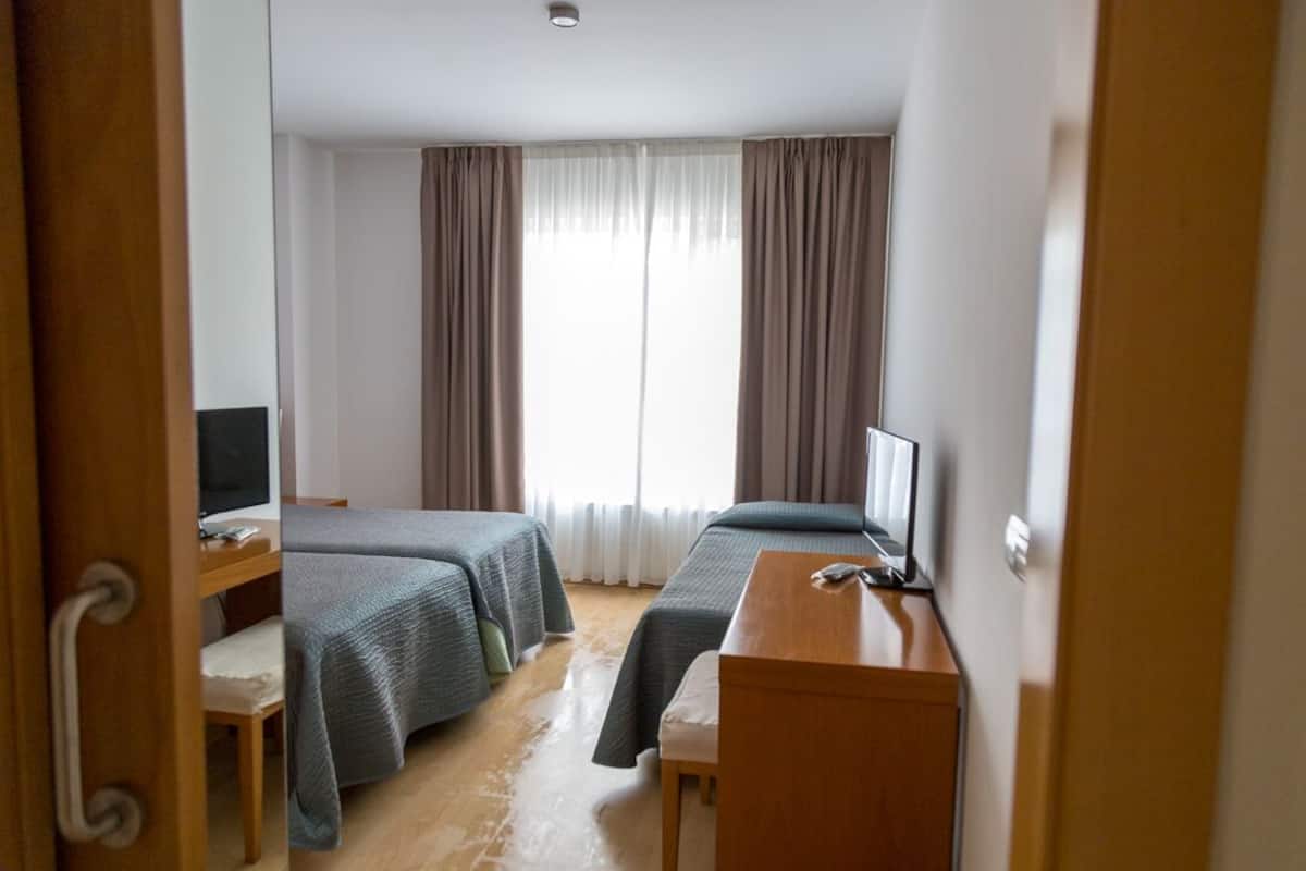 Familie driepersoonskamer | 1 slaapkamer, gratis wifi, beddengoed