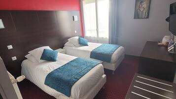 Economy Twin Room | Premium bedding, Select Comfort beds, desk, free WiFi