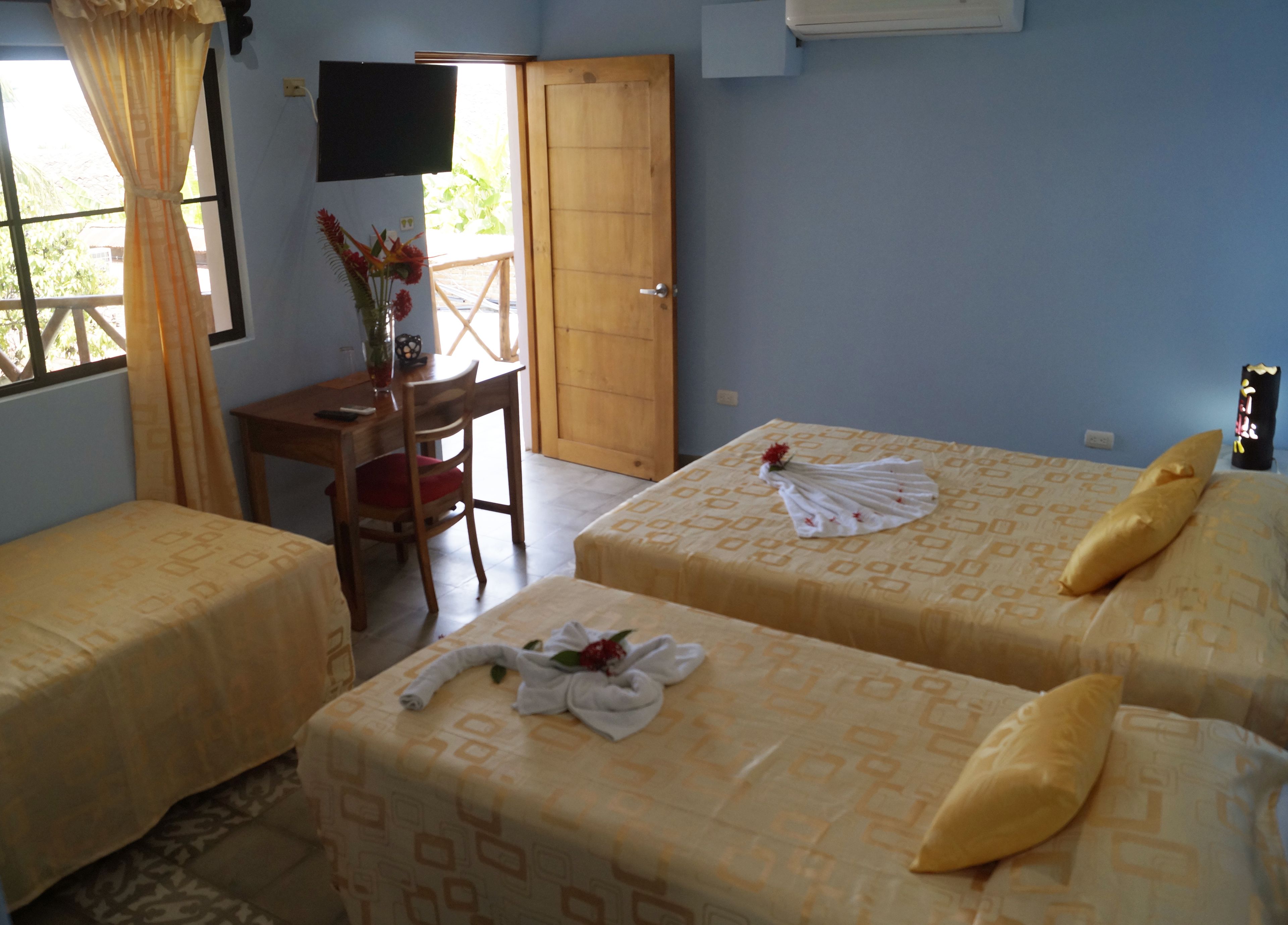 family quadruple room, private bathroom, garden area | 1 bedroom, hypo-allergenic bedding, in-room safe, individually decorated