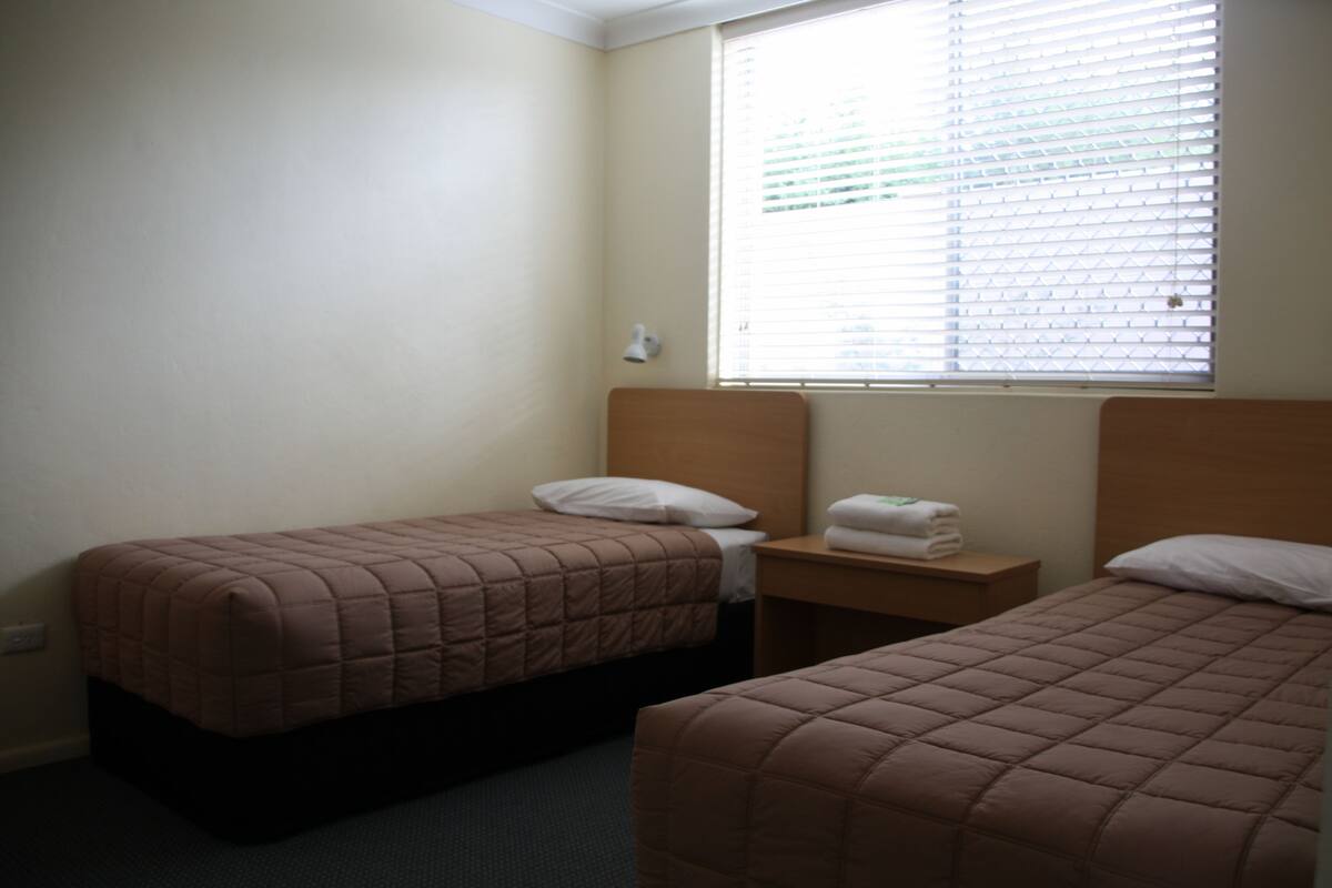 Family Suite, 2 Bedrooms, Courtyard View | Desk, iron/ironing board, WiFi (free)