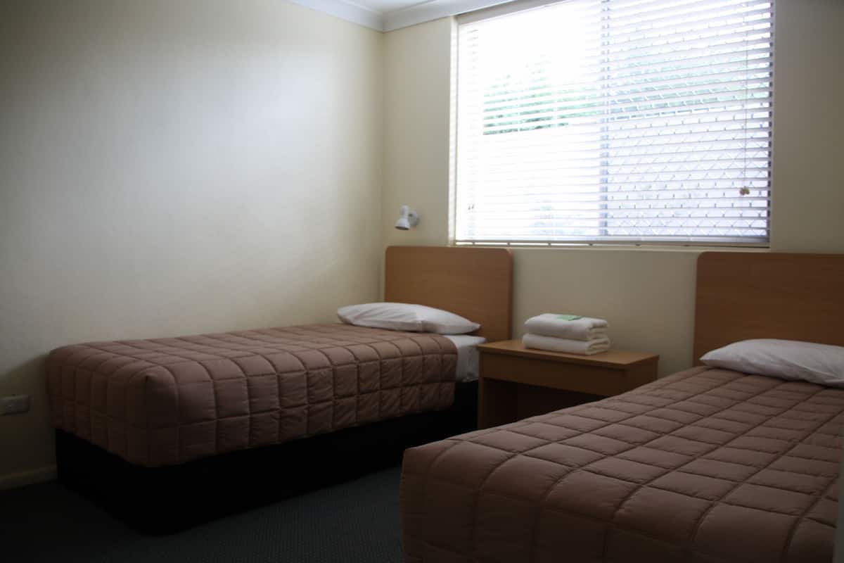 Family Suite, 2 Bedrooms, Courtyard View | Desk, iron/ironing board, free WiFi