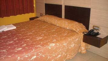 Double or Twin Room | Minibar, individually furnished, desk, blackout drapes