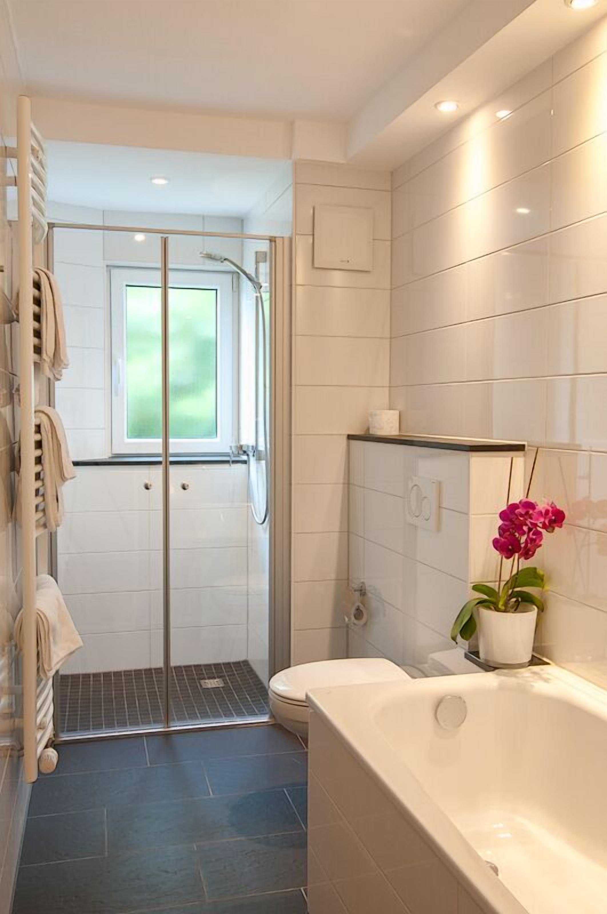 room | bathroom | shower, hair dryer, towels