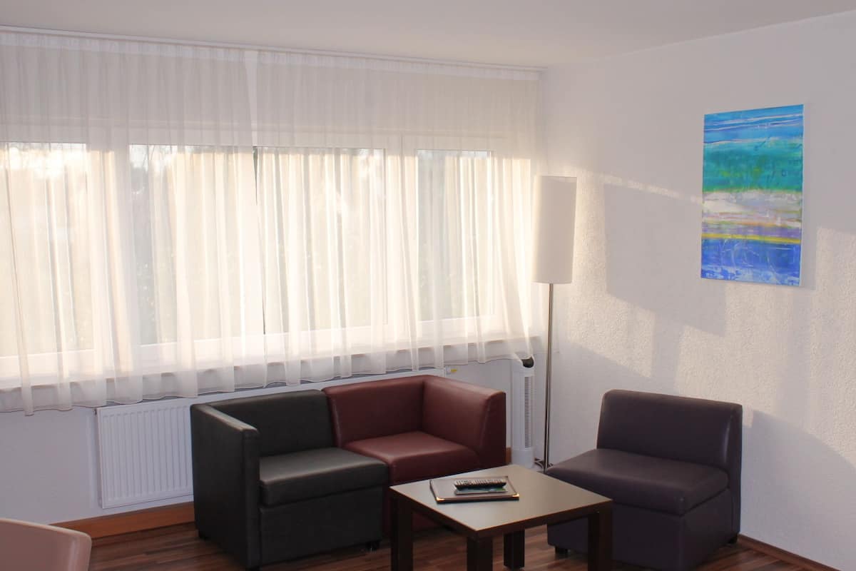 room | living area | flat-screen tv