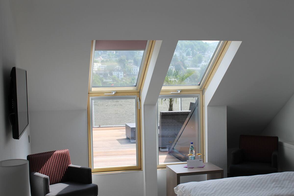 comfort double room, river view (roof terrace) | 1 bedroom, premium bedding, desk, blackout curtains