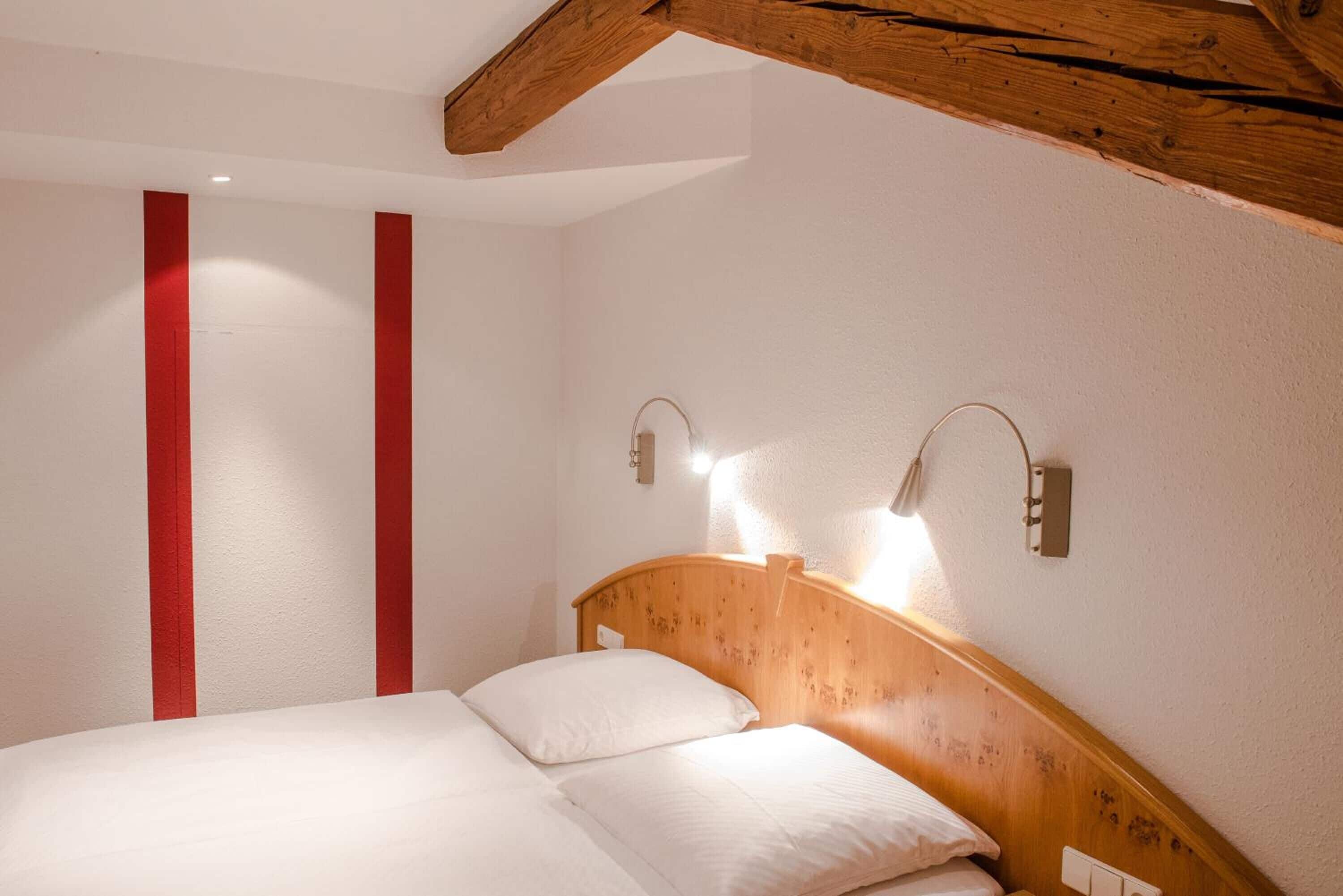 desk, cots/infant beds, free wifi, bed sheets